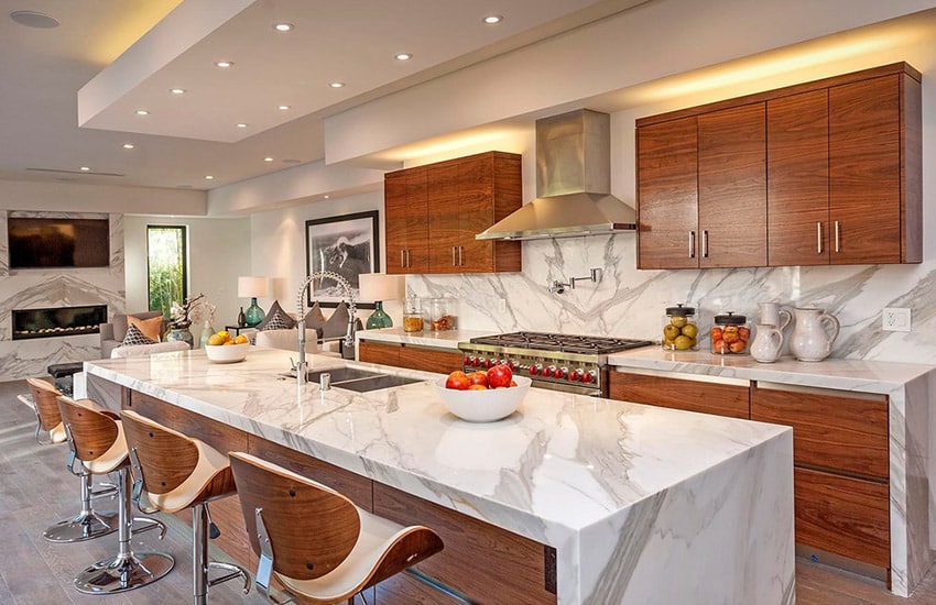 contemporary-kitchen-with-eat-in-dining-island-and-marbled-back-splash
